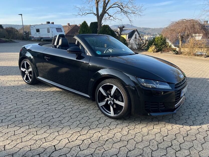 TT