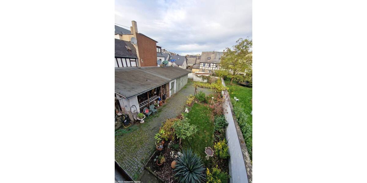 Mehrfamilienhaus mit Ladenlokal, Garagen und Garten zentral in Koblenz-Neuendorf 1 zimmer