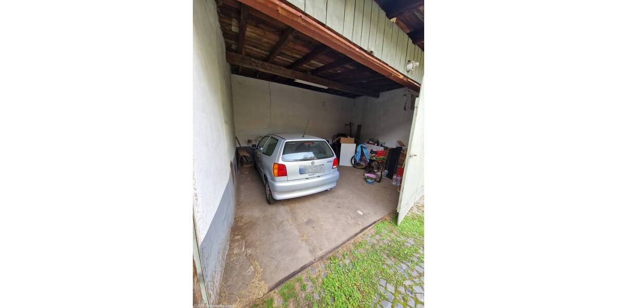 Mehrfamilienhaus mit Ladenlokal, Garagen und Garten zentral in Koblenz-Neuendorf 1 zimmer