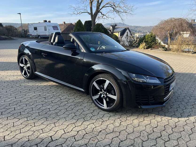 TT
