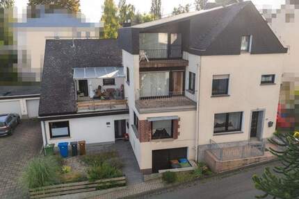 Zwei Häuser unter einem Dach - großzügiges Wohnhaus mit vermietetem Anbau, Garten, Doppelgarage 8 zimmer