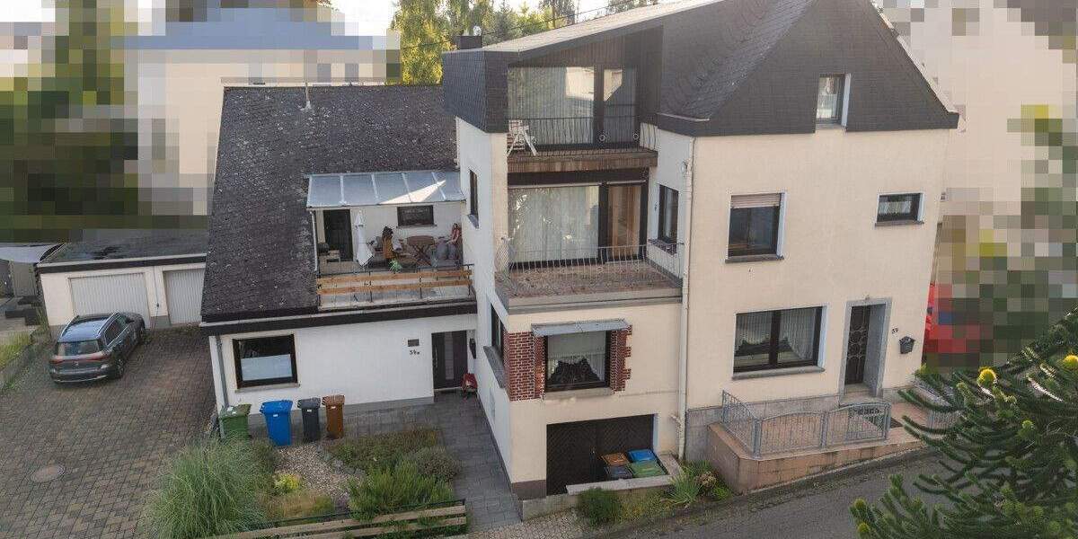 Zwei Häuser unter einem Dach - großzügiges Wohnhaus mit vermietetem Anbau, Garten, Doppelgarage 8 zimmer